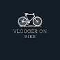 VLOGGER ON BIKE logo