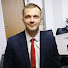 николай