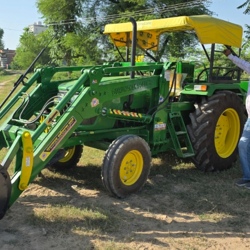 Guru Nanak thresher and Loader 
