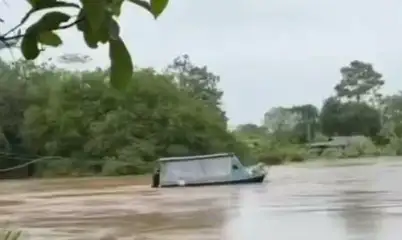 Don Juan Argueta Flores loses his boat in the Sarapiquí River after heavy rains