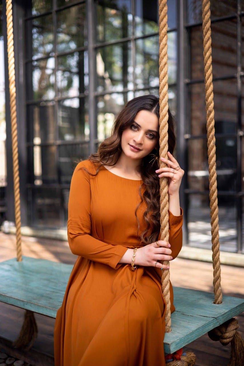 minal khan orange dress minalkhan.official wearing pink and orange combo luxury festive darshi  shalwar dress by @haseensofficial on her brother's wedding event #minalkhan  #haseensofficial #snazzyreport