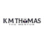 KM Thomas The Mentor logo