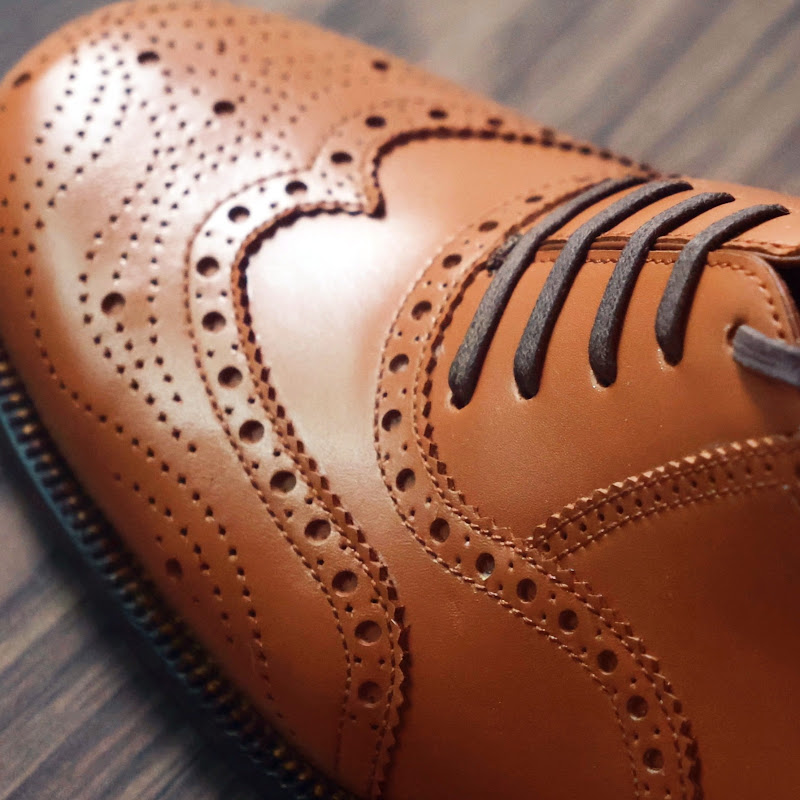 Terry Kim Shoemaker Logo