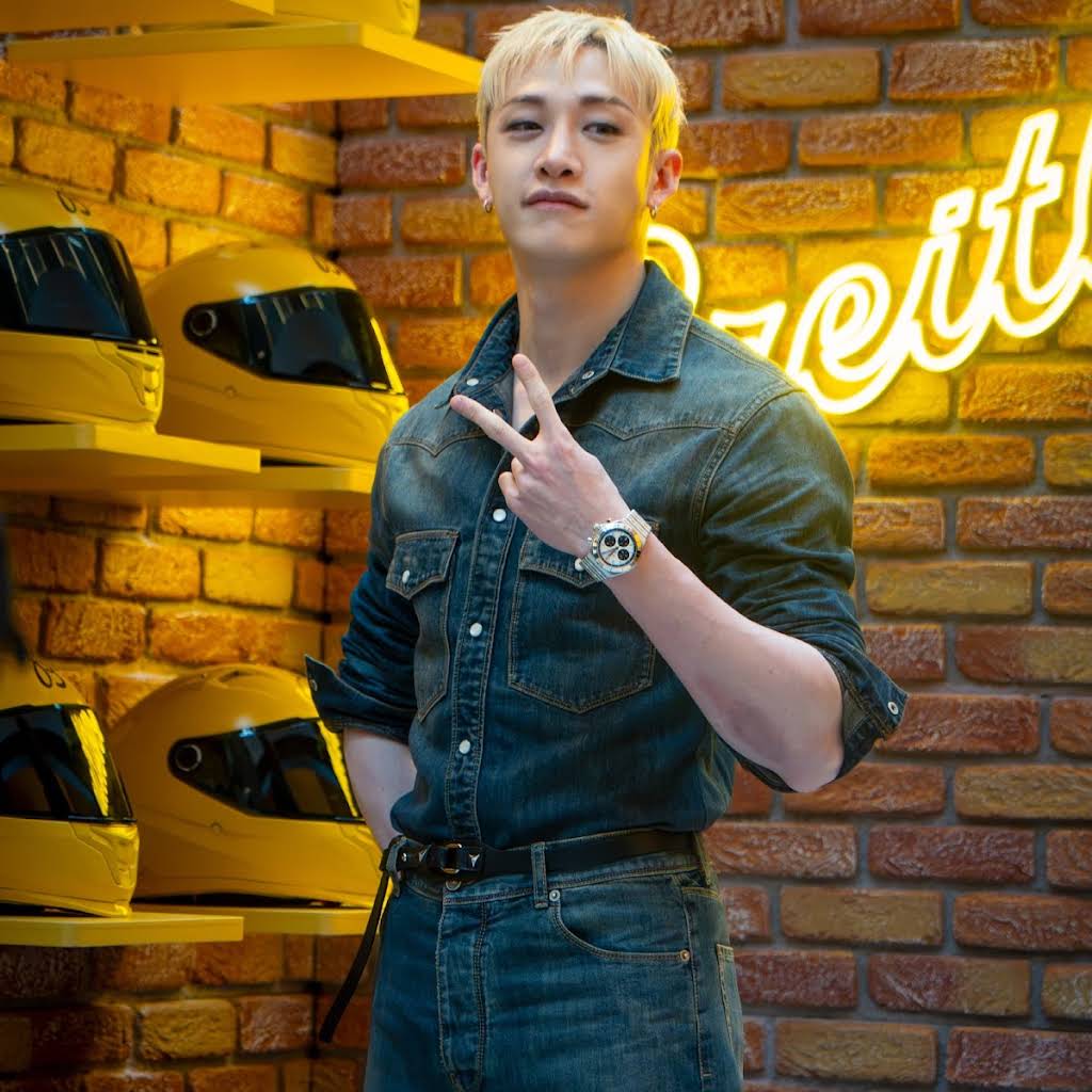 Bang Chan at the Breitling x Aston Martin Formula One pop-up