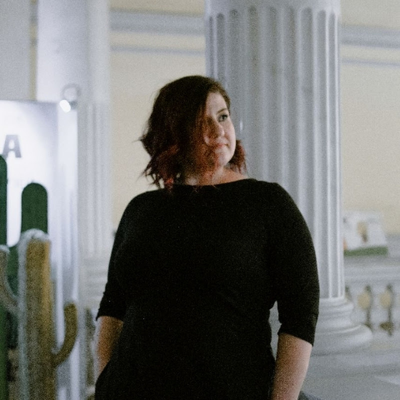 Ольга Мерас Logo