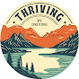 Thriving By Driving logo