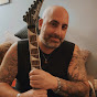 The Tatted Bald Guy