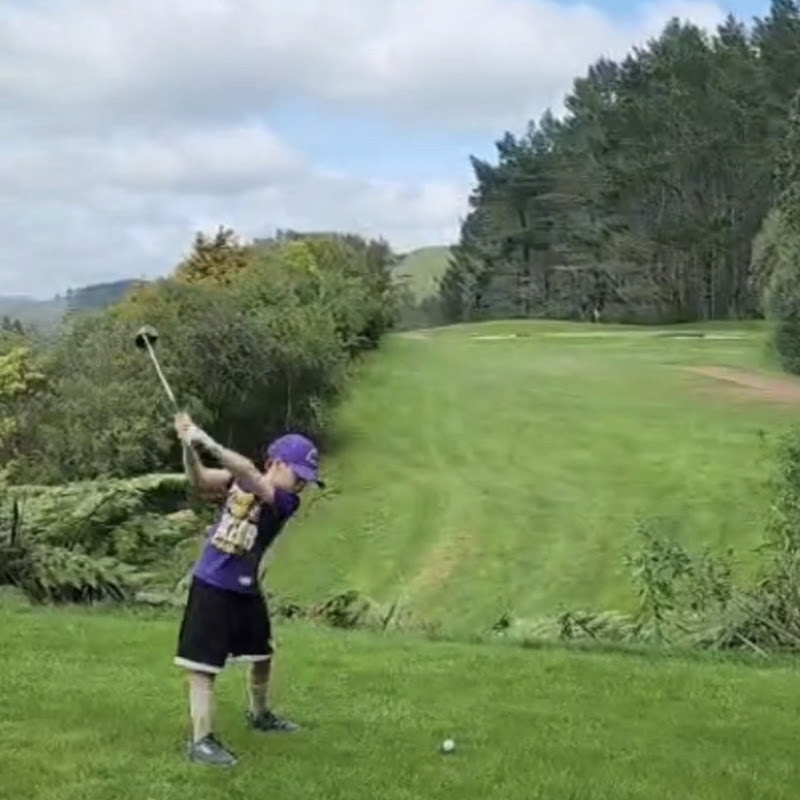Oki playing golf