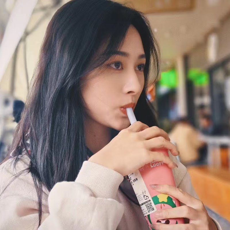 客家妹劉暢 Logo