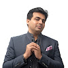 What could Amit Tandon buy with $985.89 thousand?