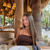 What could Giulia Savulescu buy with $100 thousand?