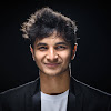 What could Vidit Gujrathi buy with $1.4 million?