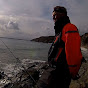 Cornish Shore and Kayak Fisherman