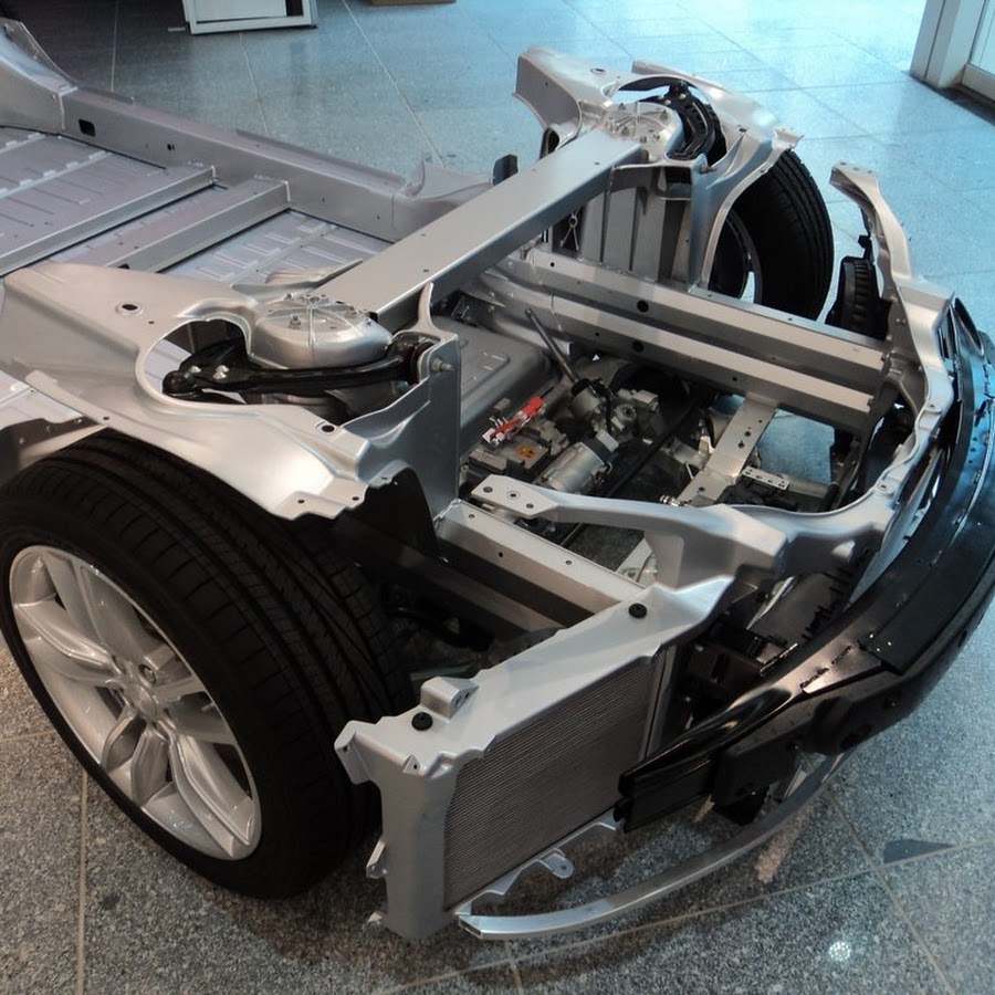 Электромотор tesla model 3. Tesla model s мотор. Электромотор tesla model 3. Тяговый электродвигатель электромобиля тесла. Электродвигатель тесла модель s.