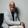 What could Madhu Bhaskaran buy with $230.4 thousand?