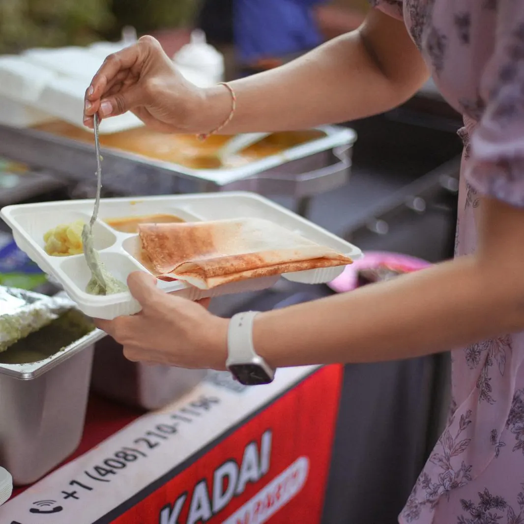 Traditional South Indian cooking methods at Madhu Idiyappa Kadai