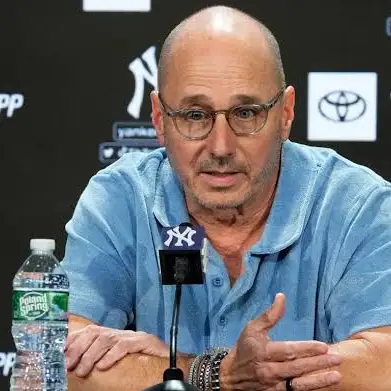 Brian Cashman will continue as general manager of the Yankees after agreeing on a new contract with the organization
