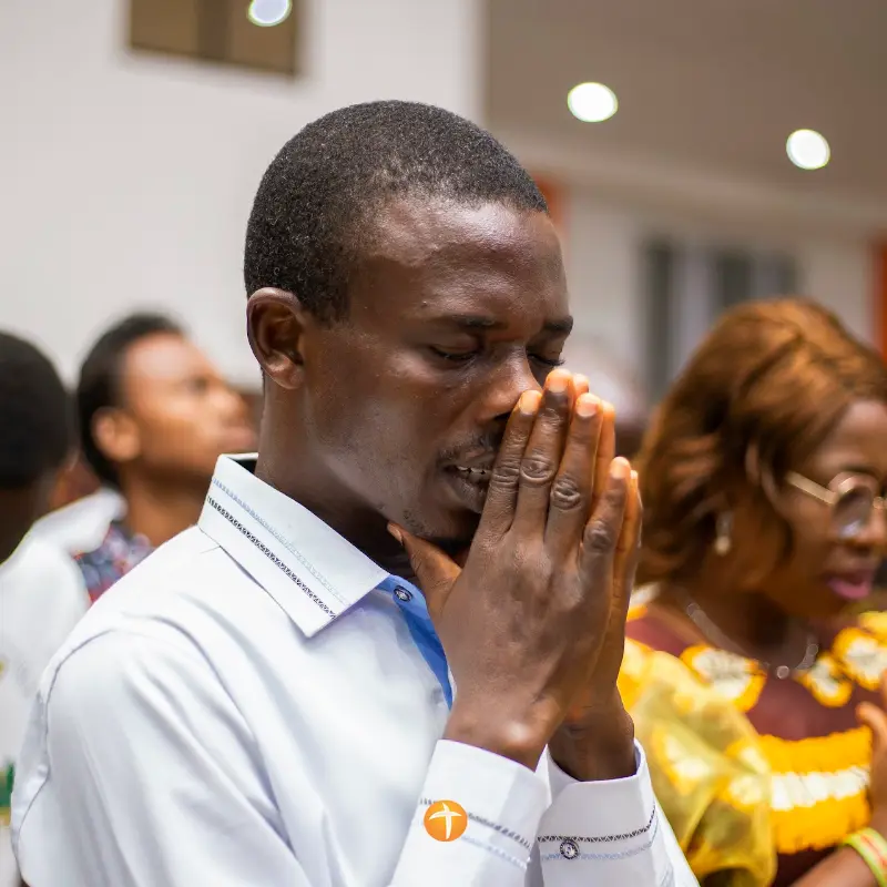 Hands folded in prayer