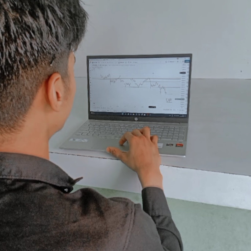 TRADER NIKESH
