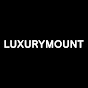 LUXURYMOUNT logo