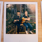 TimAndCameronPlayingGuitar logo