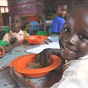 Feed With Us Uganda logo