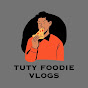 Tuty Foodie Vlogs logo