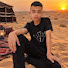 UKhR0iPyZoM-channel-avatar-مصمم God