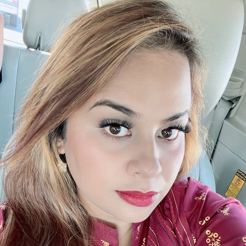 Tina  Khan