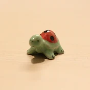 T K