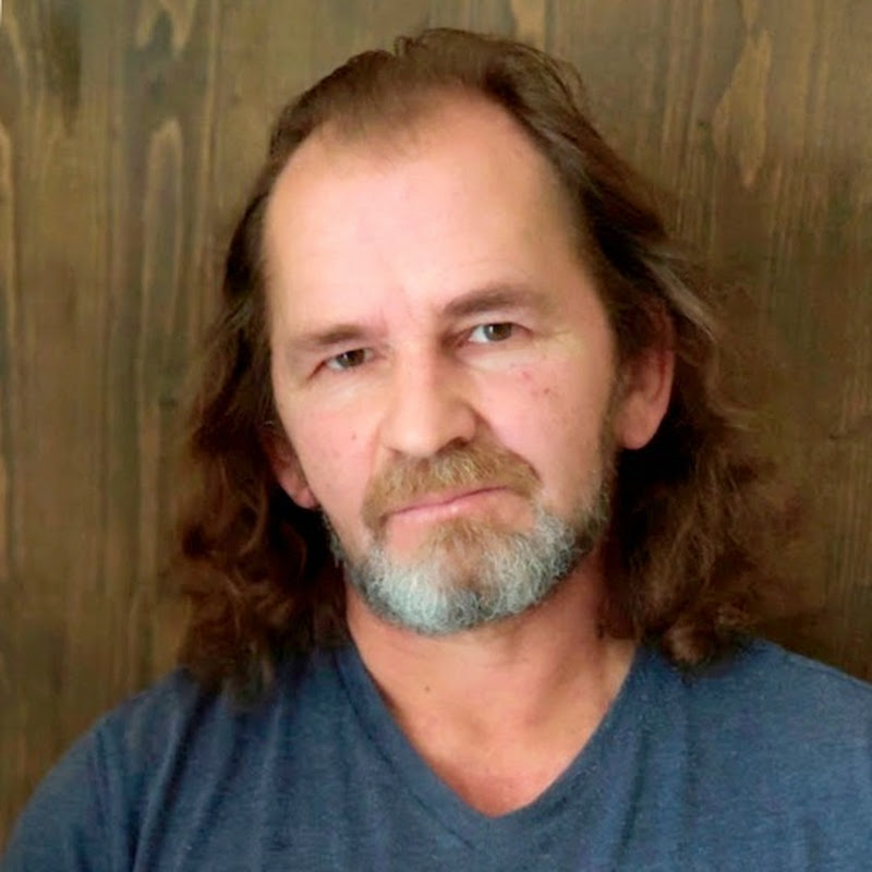 Юрий Суханов Logo