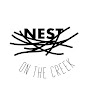 Nest on the Creek logo