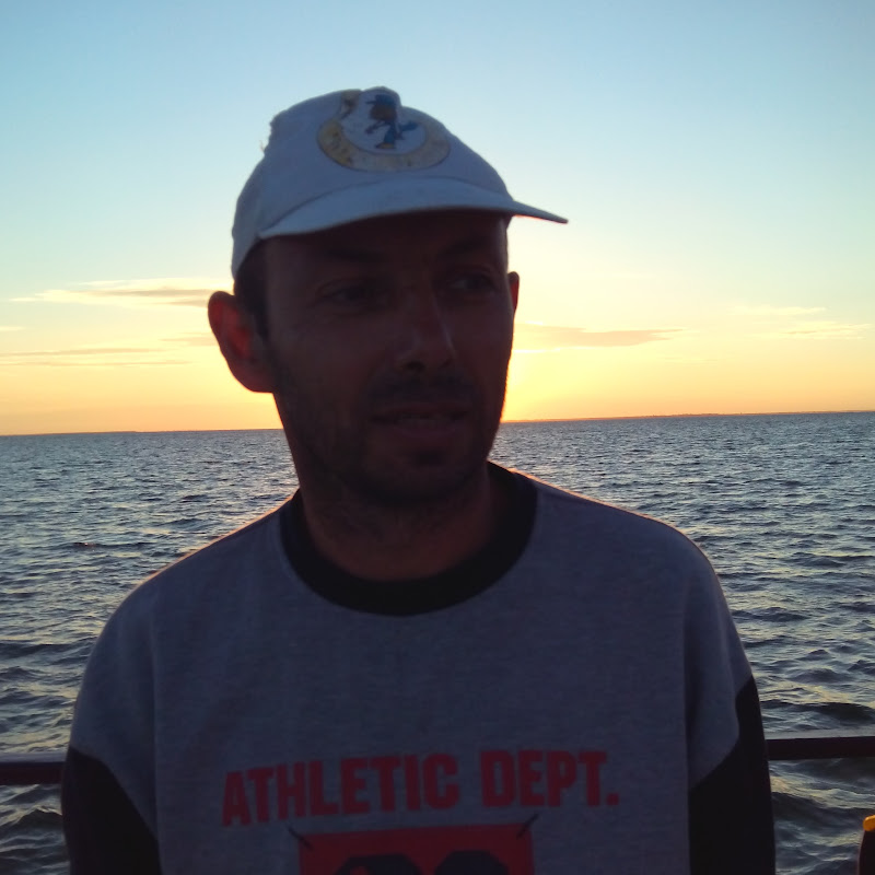 Николай Крамаренко Logo