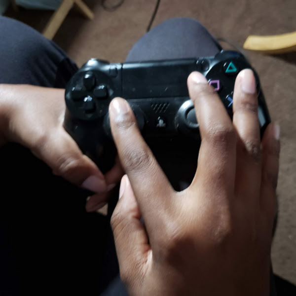 hand on controller