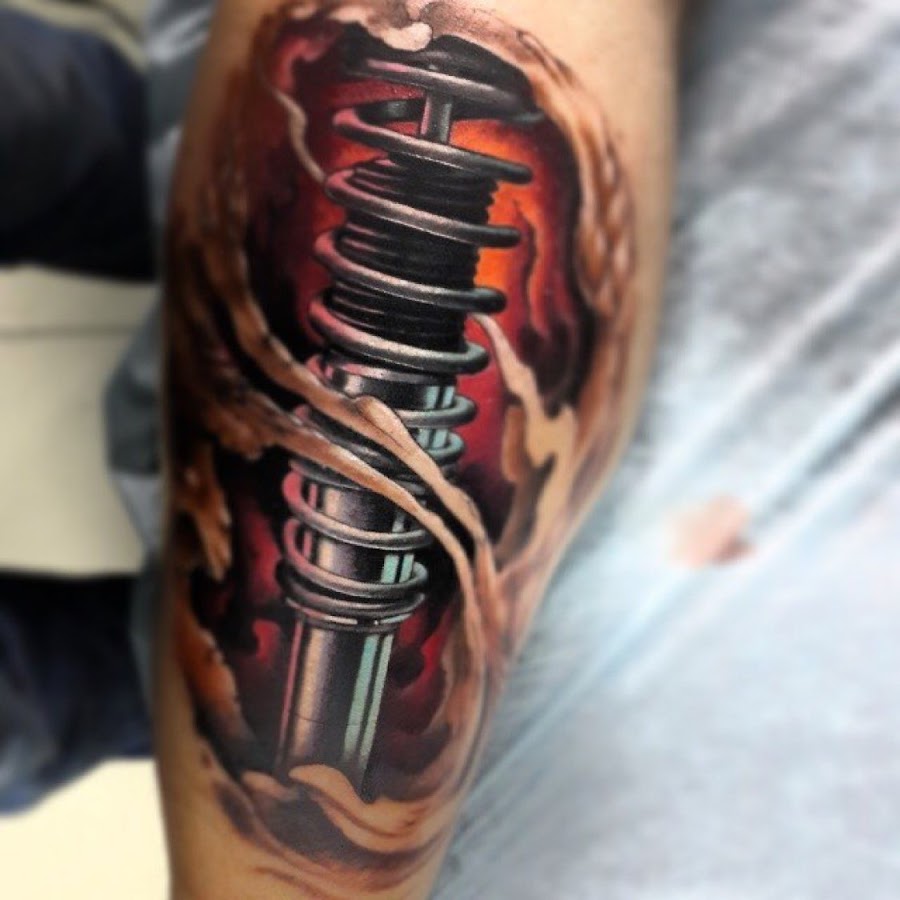Тату амортизатор на ноге. Тату амортизатор на икре. Тату на голени биомеханика. Тату биомеханика на ноге. Стойкие тату.