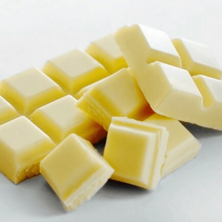 Кусочки белого шоколада. Белый шоколад. Белый молочный шоколад. Белый шоколад цвет.